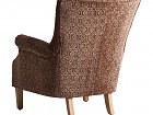 Sillón tapizado marrón de estilo clásico