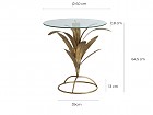 Mesa baja redonda de cristal y soporte con hojas doradas