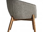 Sillón de estilo retro combinado con asiento de piel