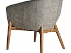 Sillón de estilo retro combinado con asiento de piel