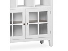 Librería blanca con estantes cerrados y cajones