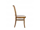 Silla con respaldo de rejilla y asiento tapizado