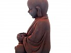 Estatua de Buda en magnesia con portavelas