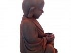 Estatua de Buda en magnesia con portavelas