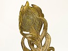 Figura pluma dorada
