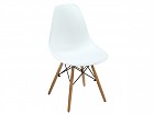 Mesa redonda de cristal con sillas Eames