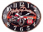 Reloj de pared ovalado Harley Davidson sobre fondo negro