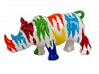 Hucha decorativa rinoceronte manchas colores