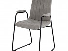 Silla tapizada efecto cuero con reposabrazos 