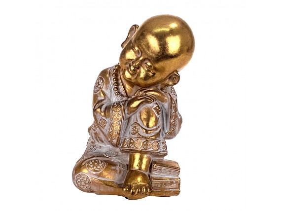 Buda bebé de resina dorada durmiendo sobre rodilla