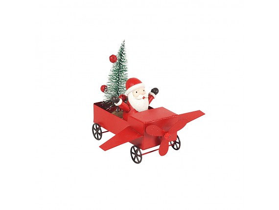 Figurita de Papá Noel en aeroplano con un árbol